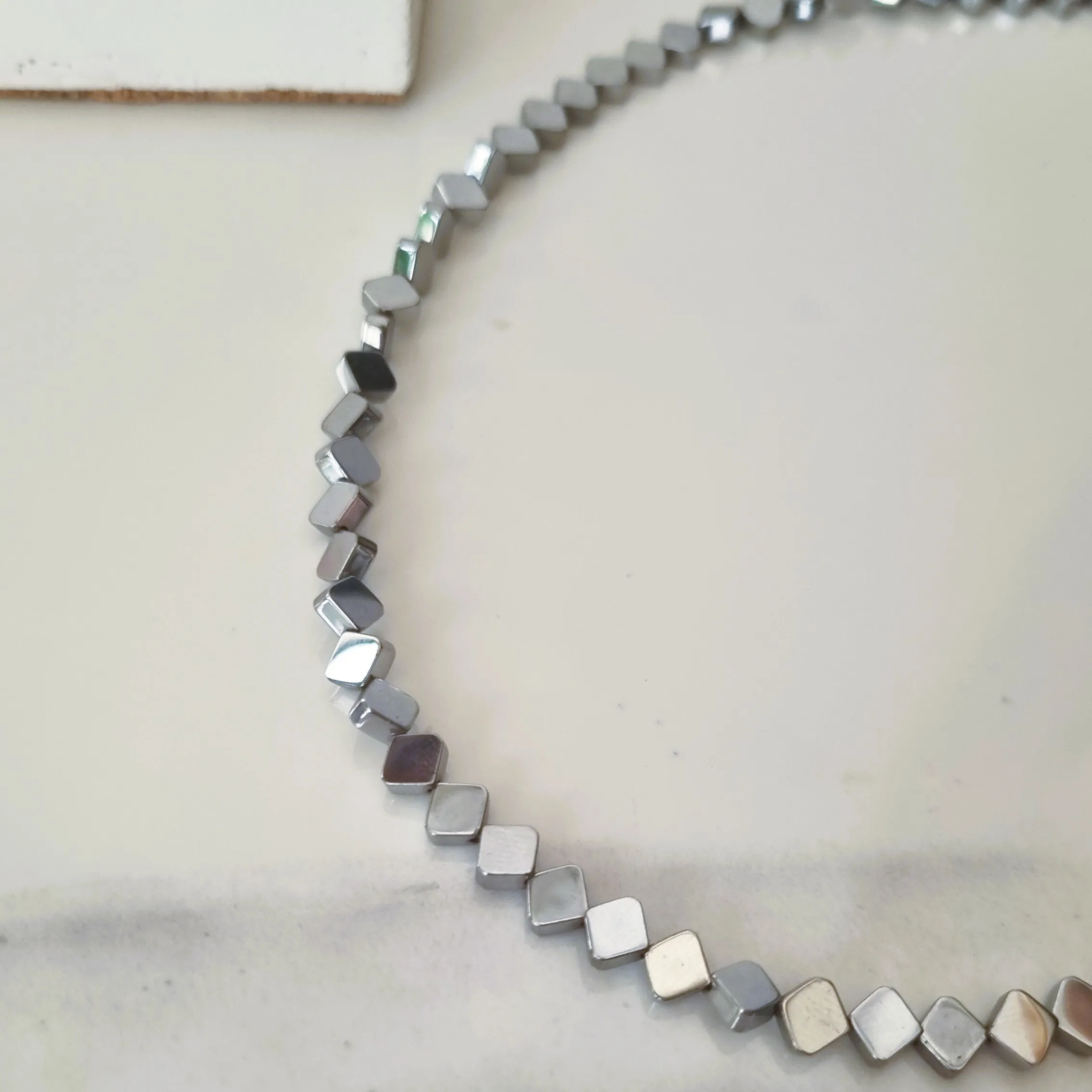 Silver hematite rhombus necklace